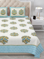 Close view of the bed showing rows of bouquet butas and the aqua-blue patterned border
