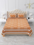 Front view of Castile India burnt orange geometric buta bedsheet 90x108 on a bed with 2 pillow covers