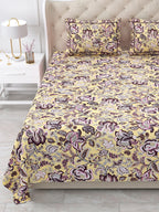 Close view of the butter yellow floral bedsheet and pillow covers on the bed