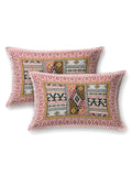 Two pillow covers with a coral pink geometric border and coral & mustard Aztec patchwork centre
