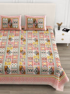 Close front view of the coral & mustard geometric patchwork bedsheet and pillow covers