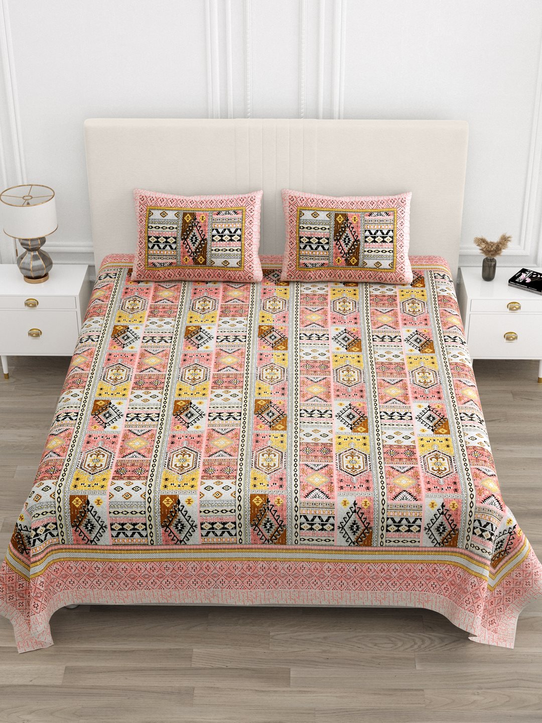 Front view of Castile India coral & mustard Aztec patchwork super king size bedsheet 108x108 with 2 pillow covers