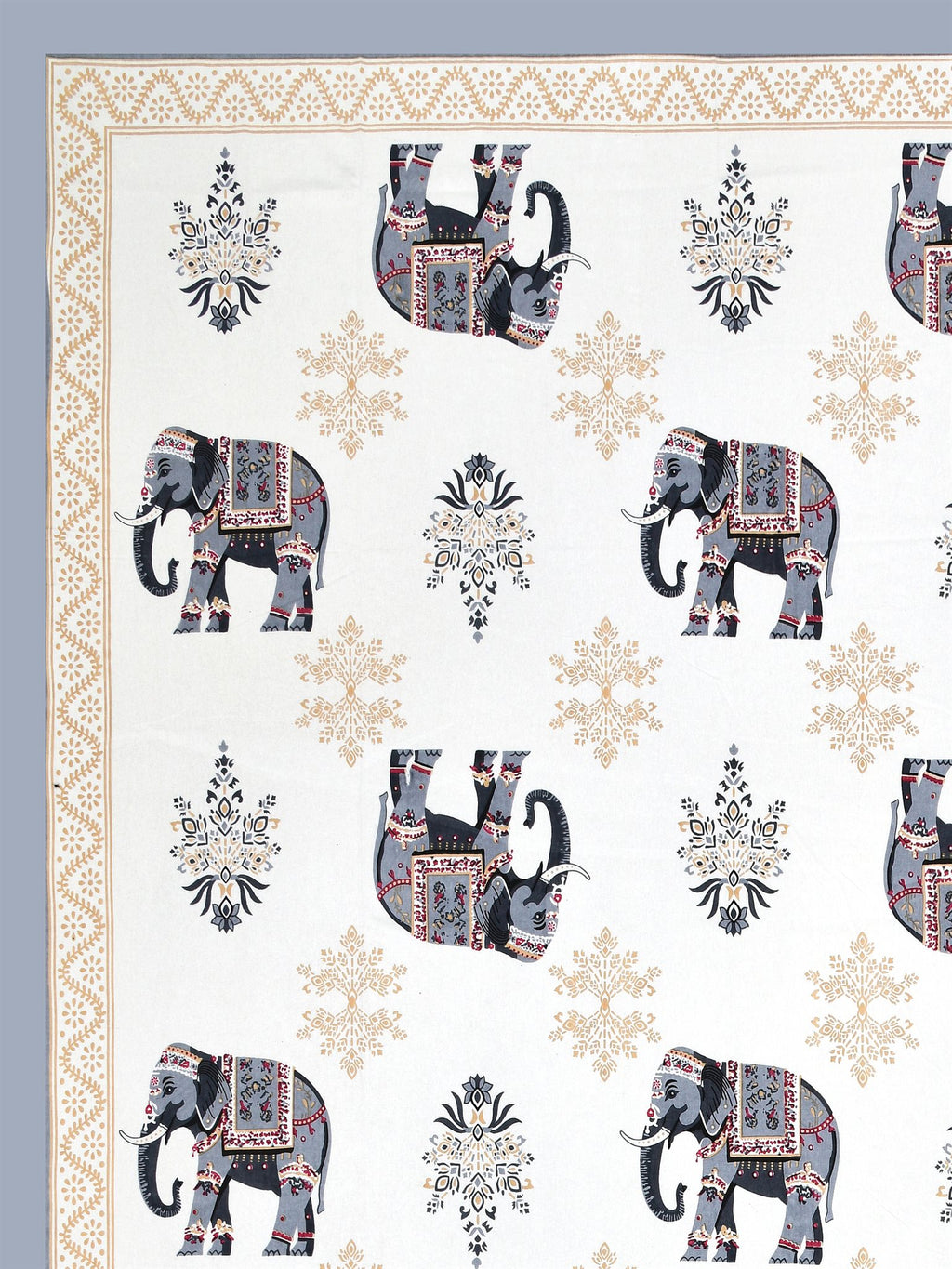 Close-up of decorated grey & beige elephants and beige floral butas on a white base