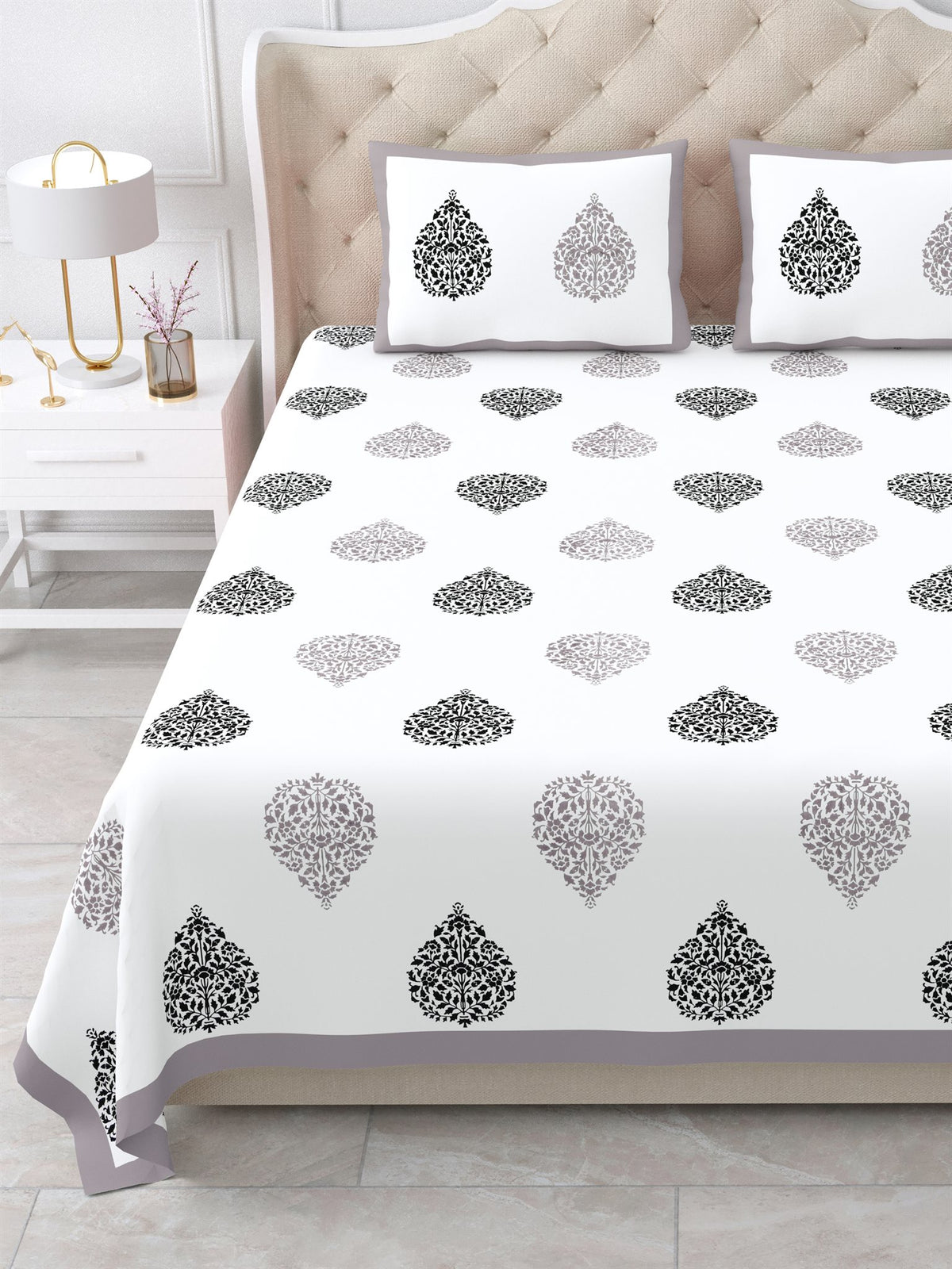 Close front view of the grey & black damask buta bedsheet and pillow covers