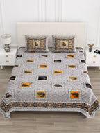 Front view of Castile India grey and orange peacock motif bedsheet 90x108 on a bed with 2 pillow covers