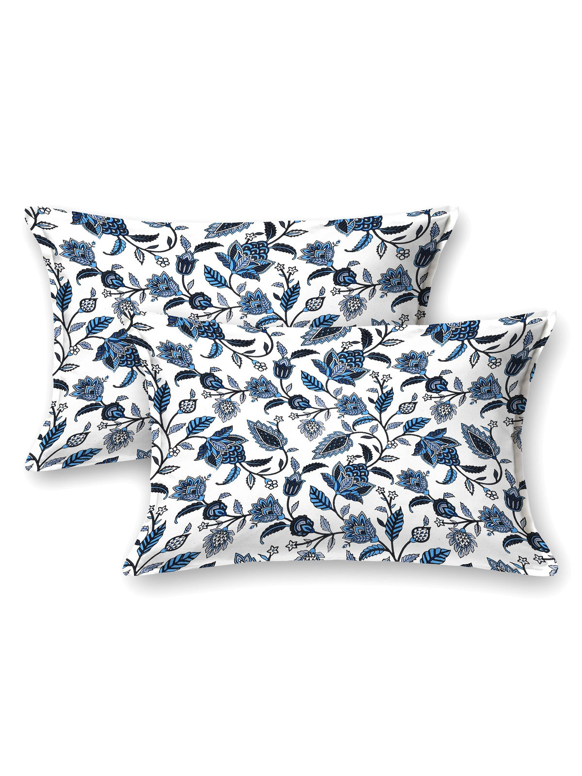 Two white pillow covers with indigo and navy trailing floral vine print
