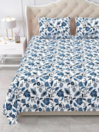 Close view of the indigo floral vine bedsheet and pillow covers on the bed