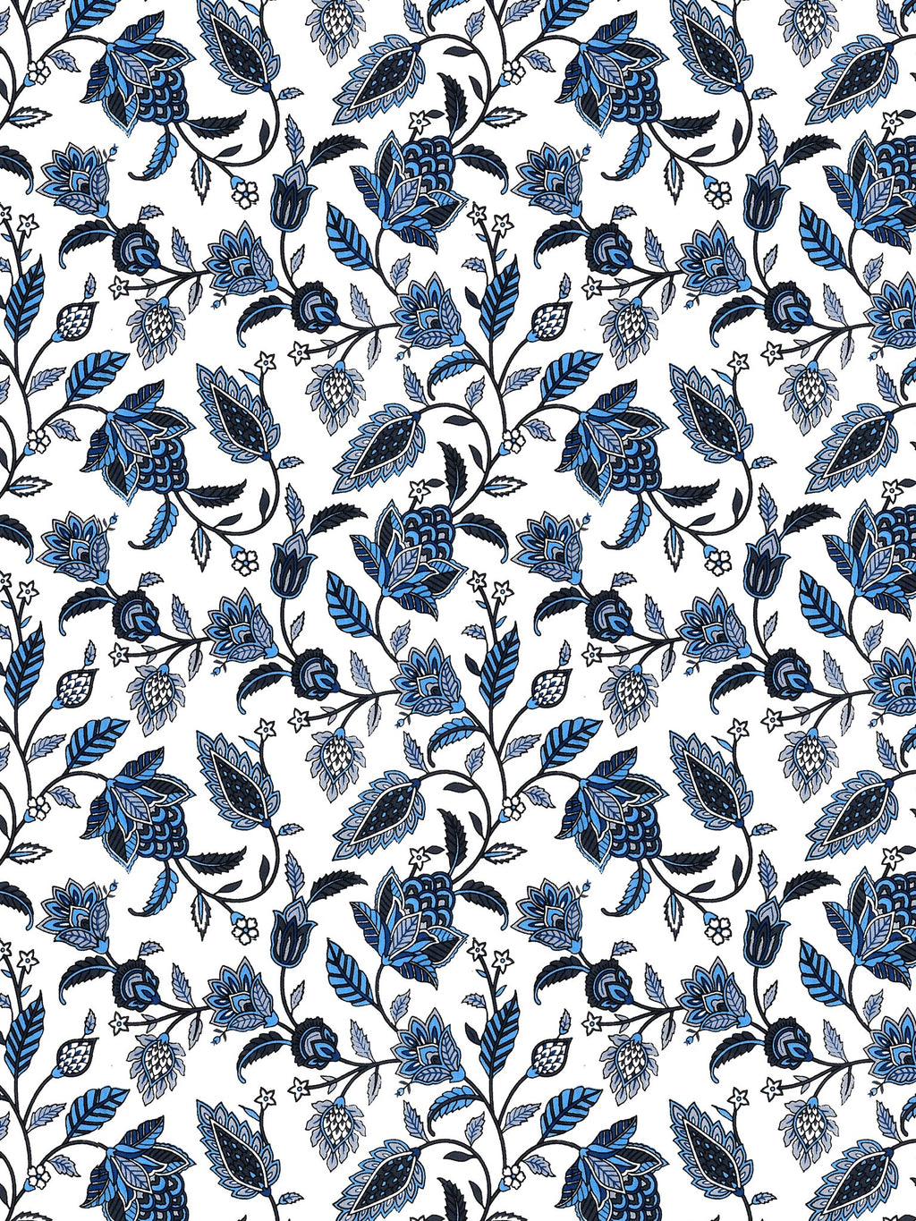 Close-up of the trailing indigo and navy floral vine pattern on white