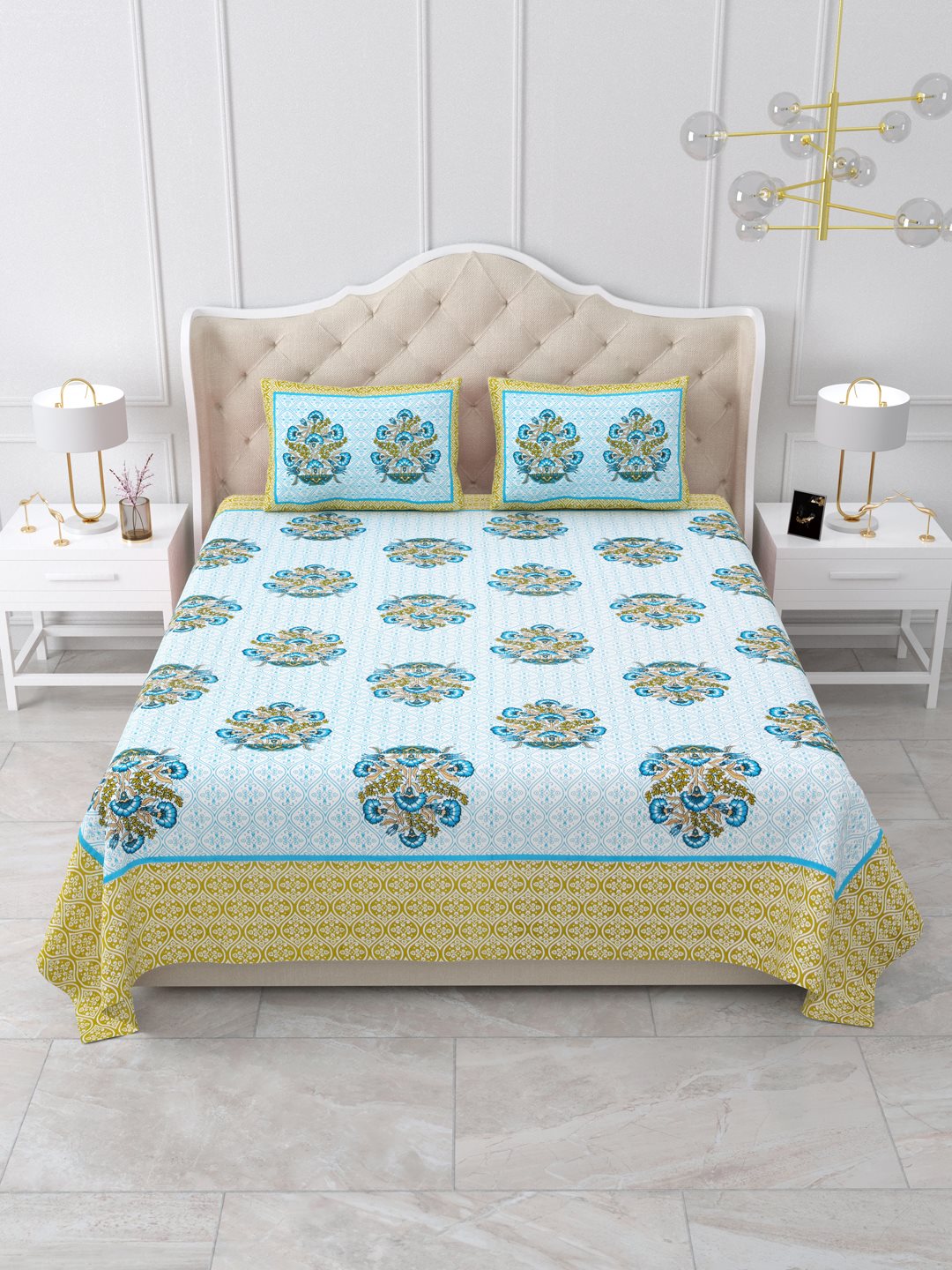Front view of Castile India green border bouquet buta bedsheet 90x108 on a bed with matching pillow covers