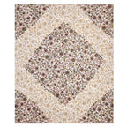 Full flat view of the maroon and beige 90x108 bedsheet with floral diamond centre and corners