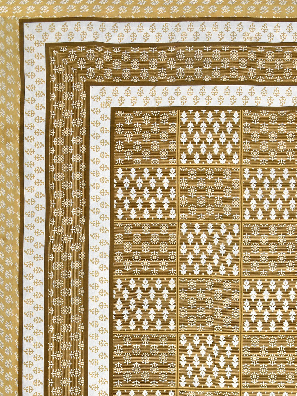 Flat corner view of the mustard bedsheet showing the buta grid and layered borders