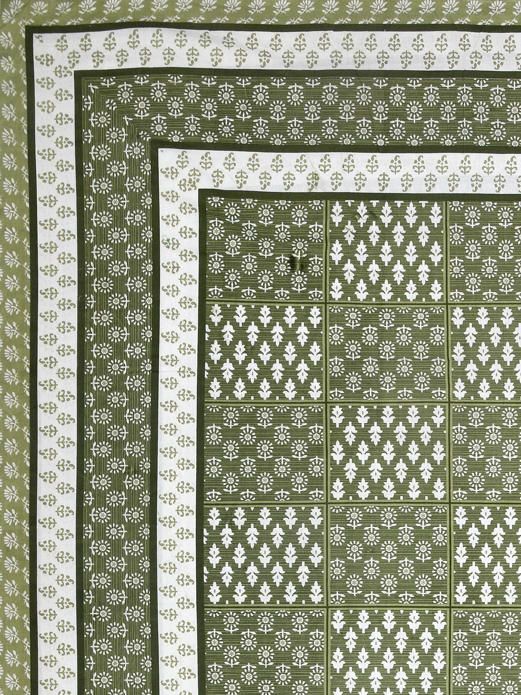 Flat corner view of the olive green bedsheet showing the buta grid and layered borders
