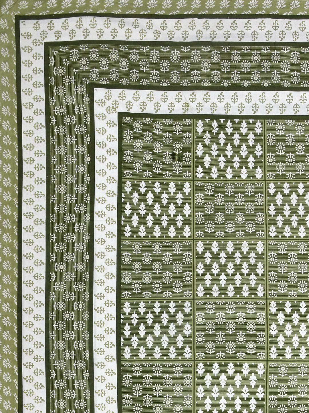 Flat corner view of the olive green bedsheet showing the buta grid and layered borders