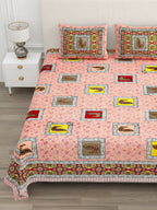 Close view of peacock patches and the ornamental border on the peach bedsheet