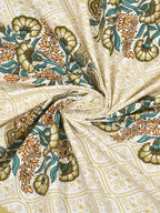 Swirled fabric close-up of olive, teal and peach floral bouquets on a cream lattice background