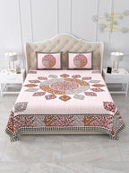 Front view of Castile India pink and maroon leaf mandala bedsheet 90x108 on a bed with 2 pillow covers