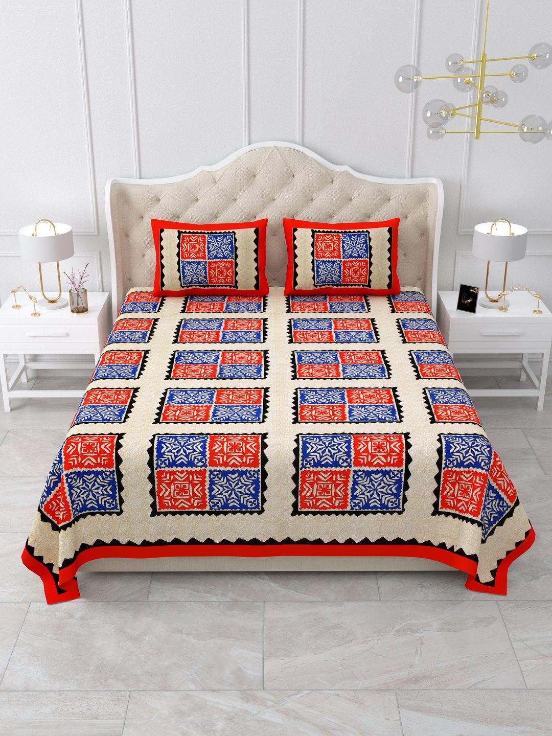 Front view of Castile India red and blue patchwork square bedsheet 90x108 on a bed with 2 pillow covers