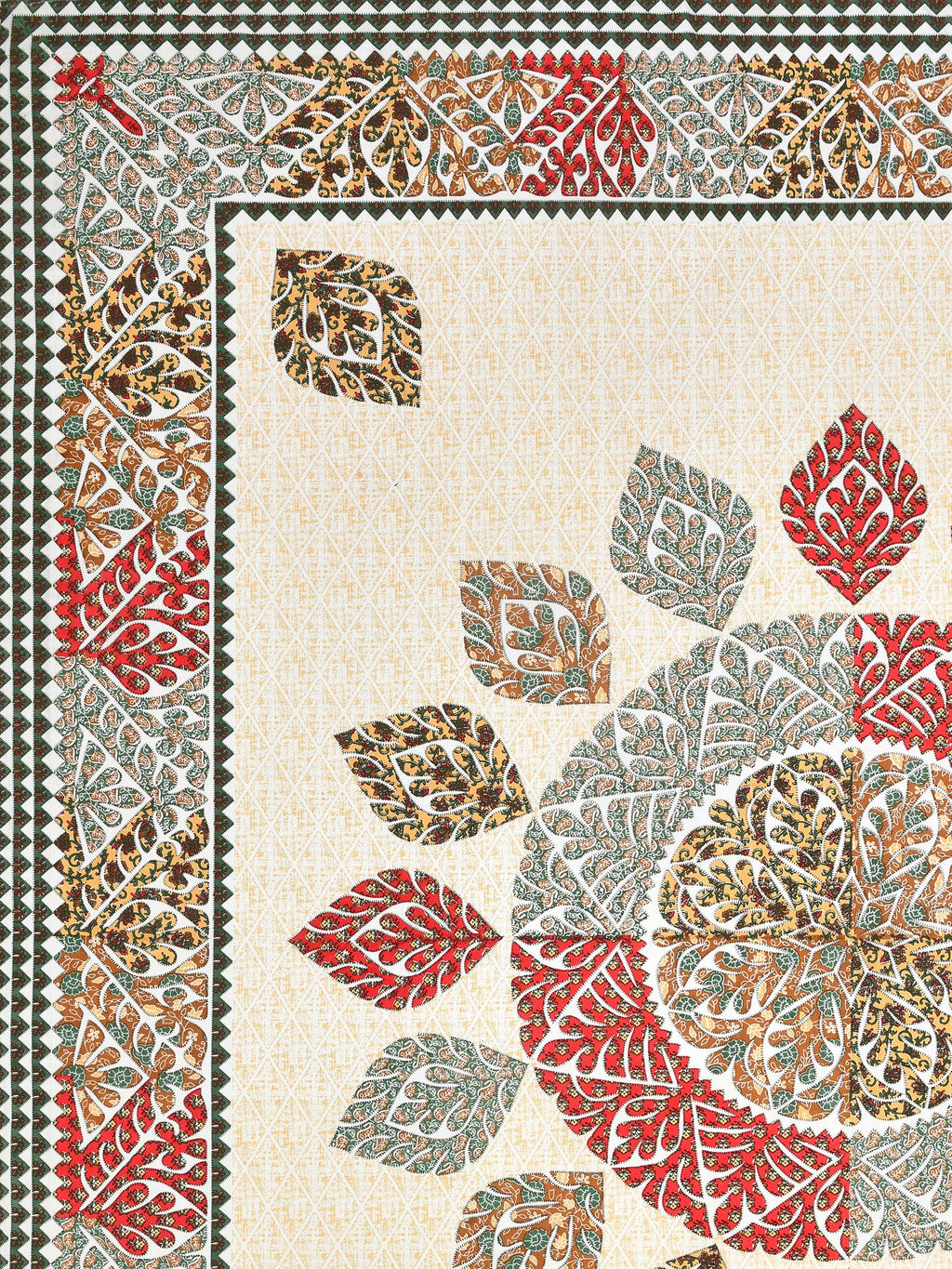 Flat corner close-up of the leaf mandala and red and sage leaf border on a cream base