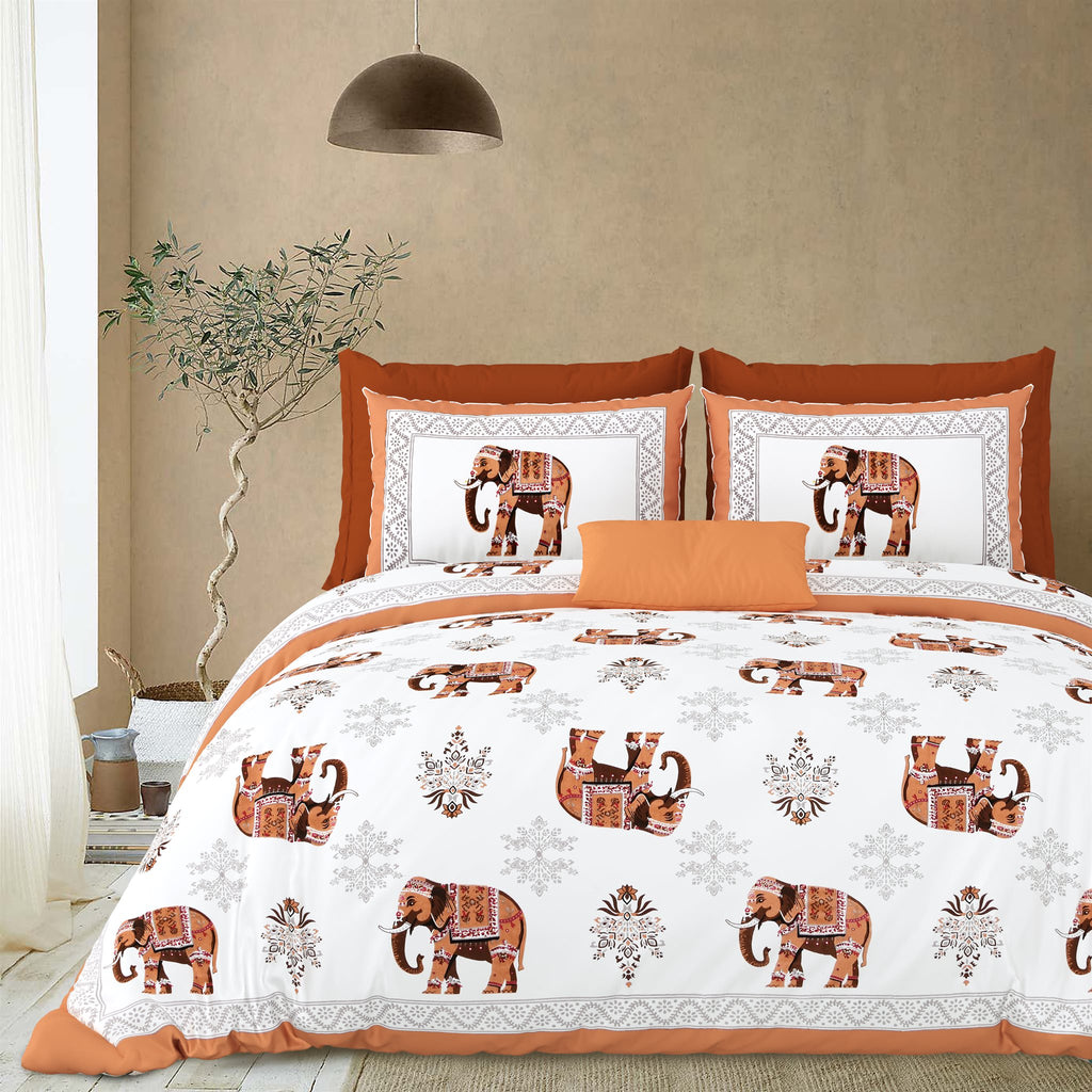 Styled bedroom view of the rust orange elephant print bedsheet with pillow covers