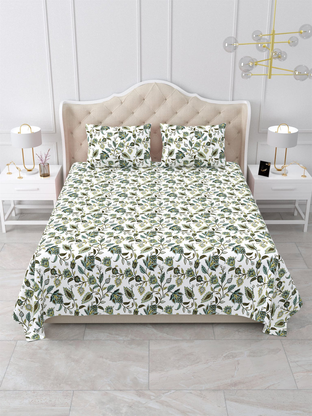 Front view of the sage green and white floral vine bedsheet on a bed with 2 matching pillow covers