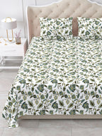 Close view of the olive and sage floral vine bedsheet and pillow covers on the bed