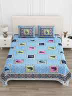 Front view of Castile India sky blue peacock motif bedsheet 90x108 on a bed with 2 pillow covers