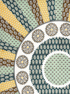 Close-up of the mandala rings and teal, mint, mustard and brown paisley stripes